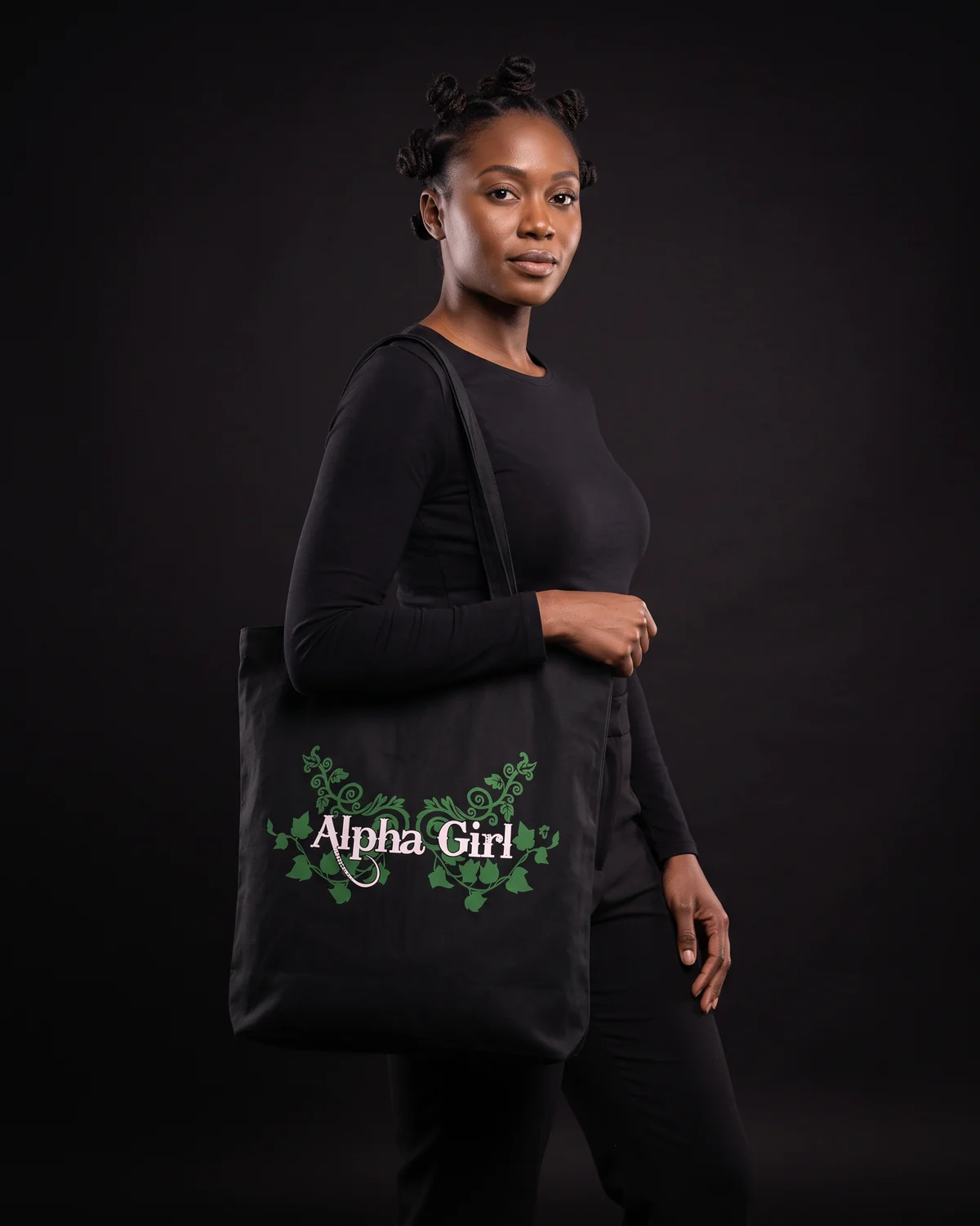 Model carrying the Alpha Girl tote