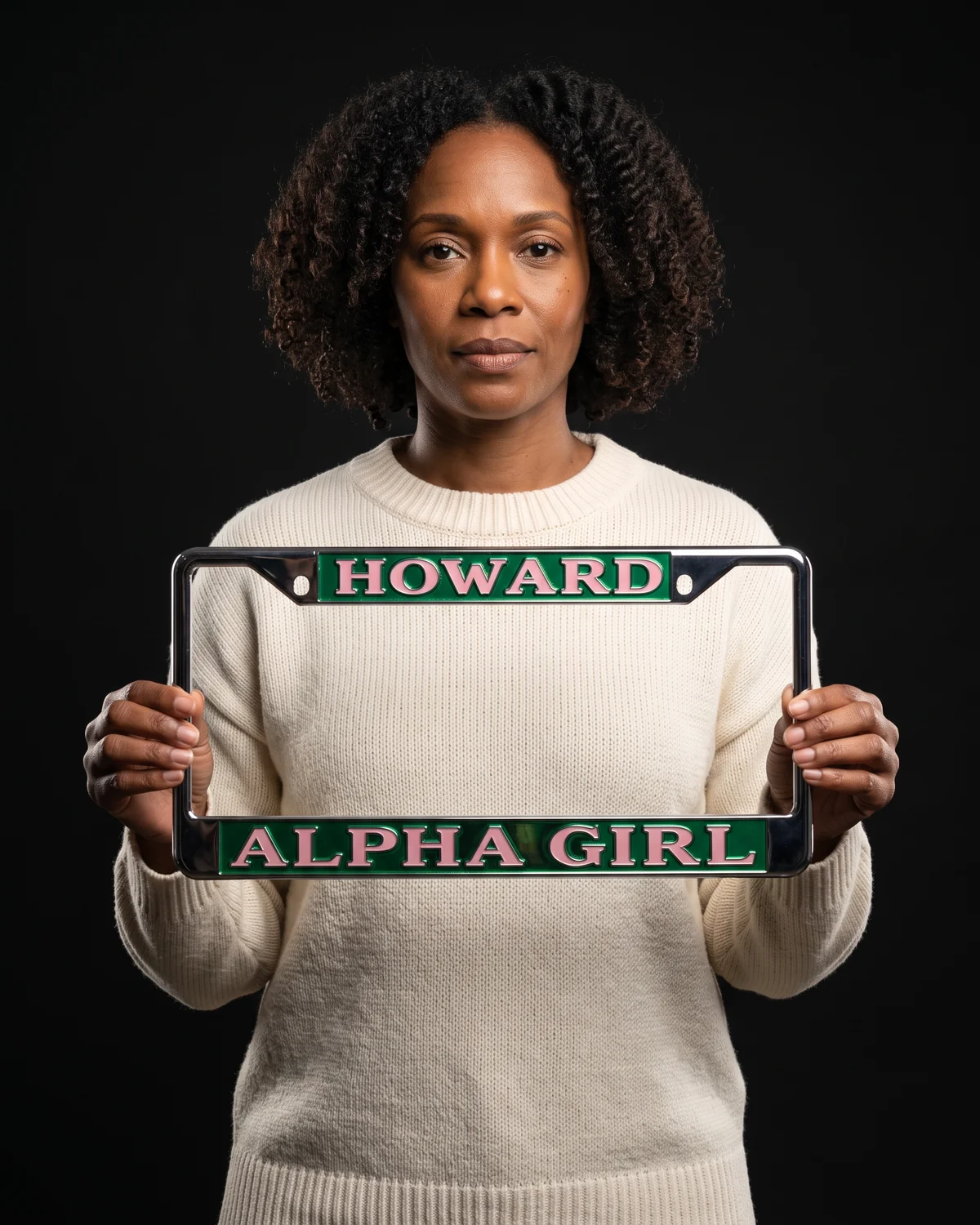 Model holding an Alpha Girl plate frame